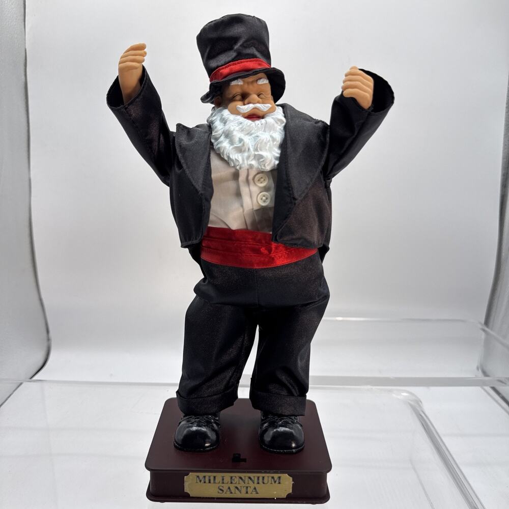 Millennium Trim A Home Santa 13" Animated Dances To The Song "Celebrate "